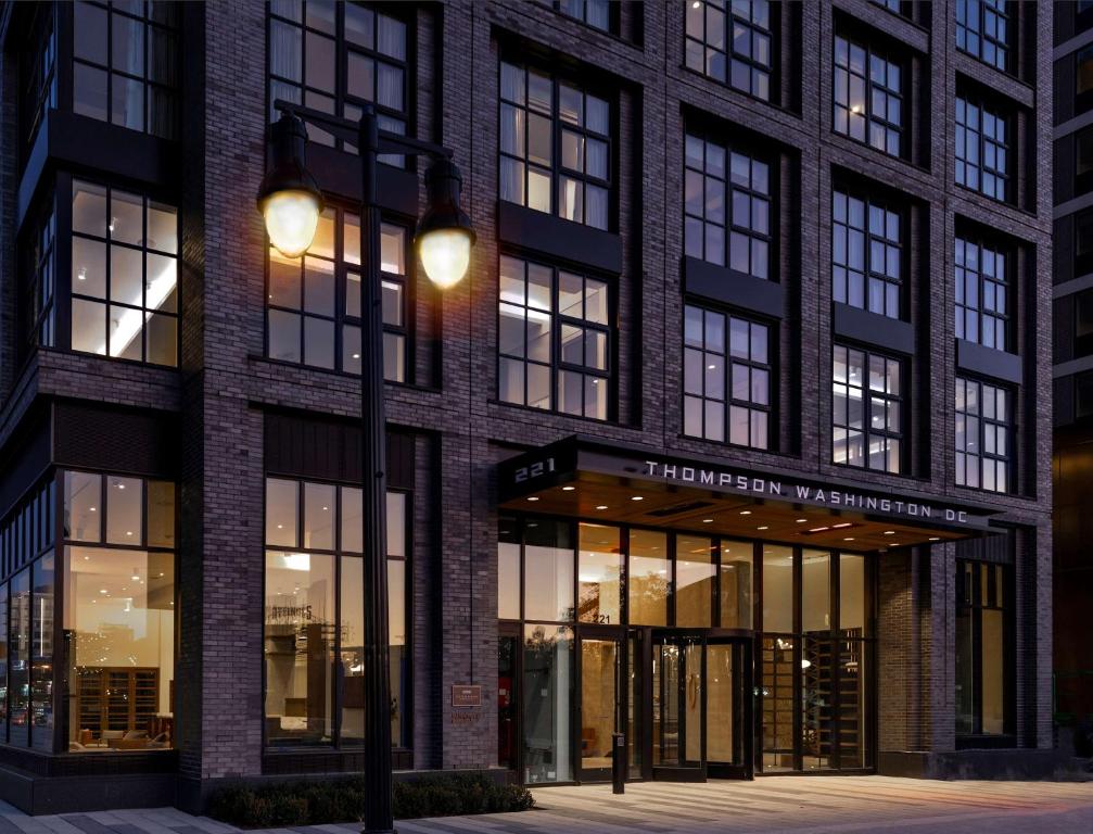 a building with a street light in front of it at Thompson Washington DC, by Hyatt in Washington