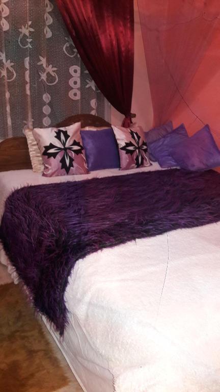 Postel nebo postele na pokoji v ubytování Daffon Guest House