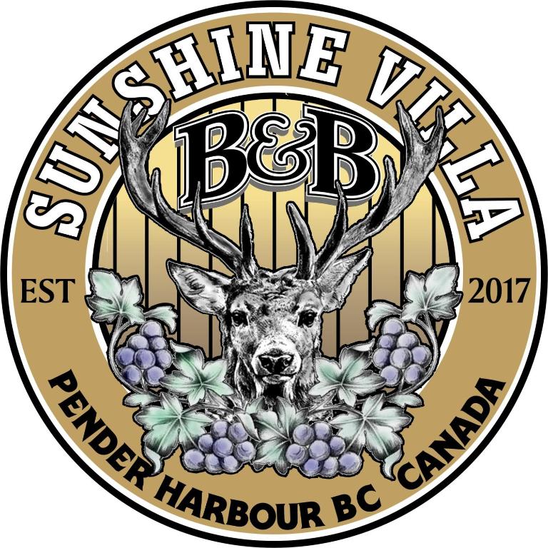 a deer with areath of grapes and the words shine village best harbin be at Sunshine Villa B&B in Madeira Park
