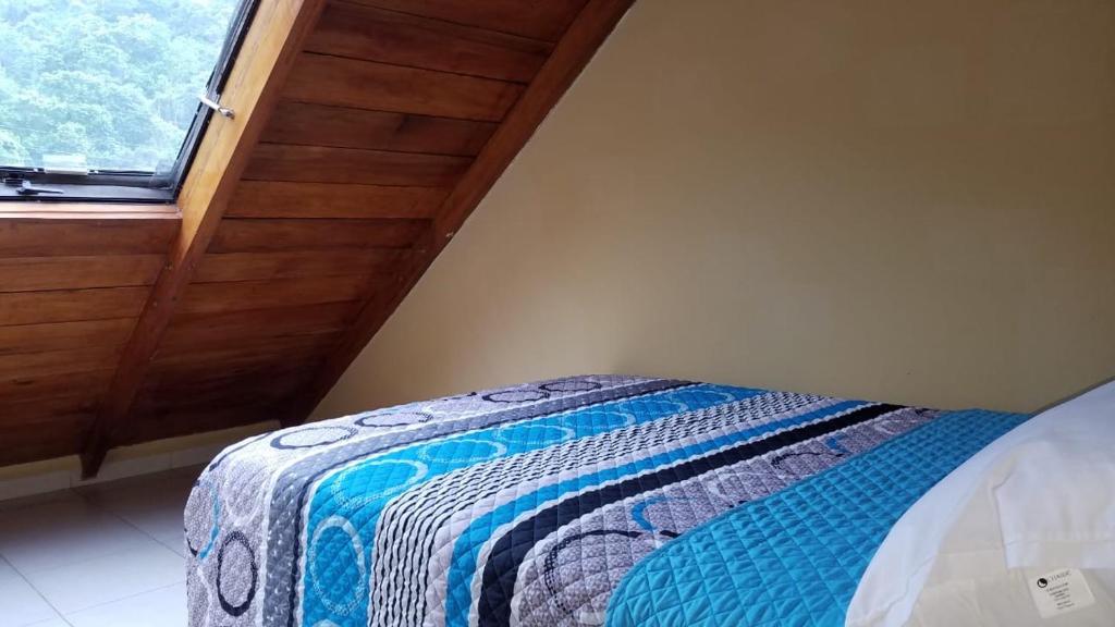 Postel nebo postele na pokoji v ubytování Hotel Soberao