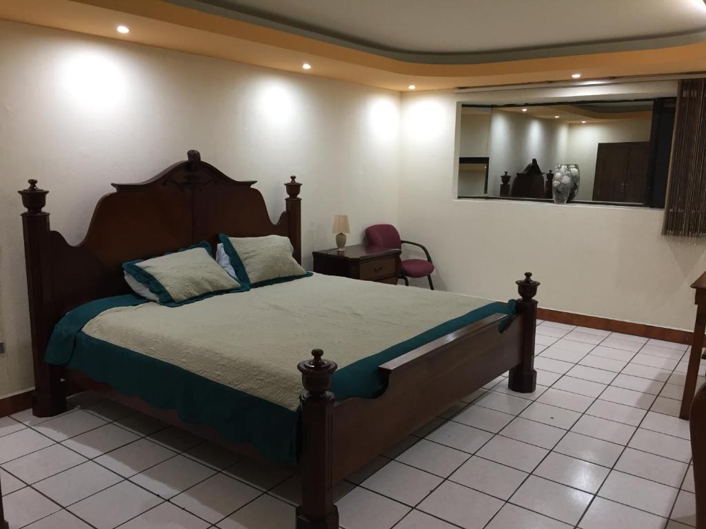 Postel nebo postele na pokoji v ubytování Casa Irma