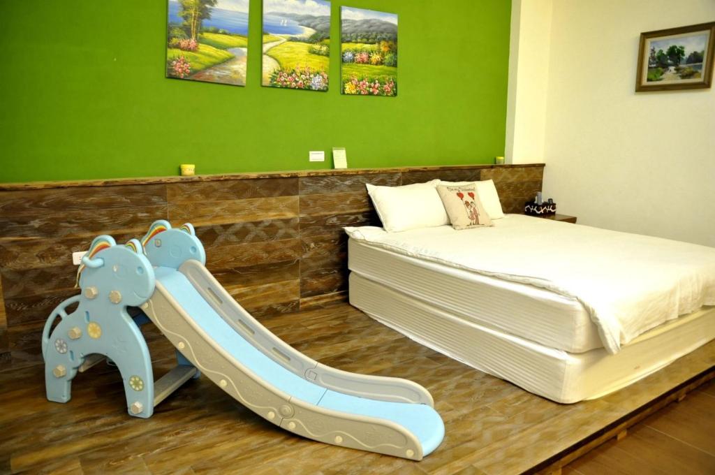Postel nebo postele na pokoji v ubytování Sky Bird Garden B&B