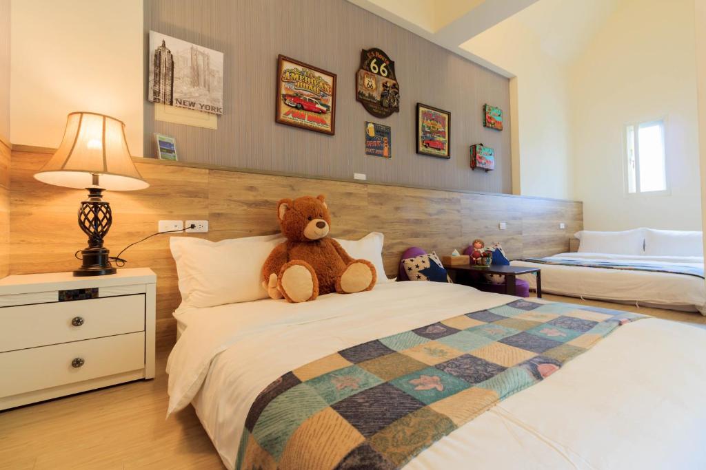 Postel nebo postele na pokoji v ubytování Sky Bird Garden B&B