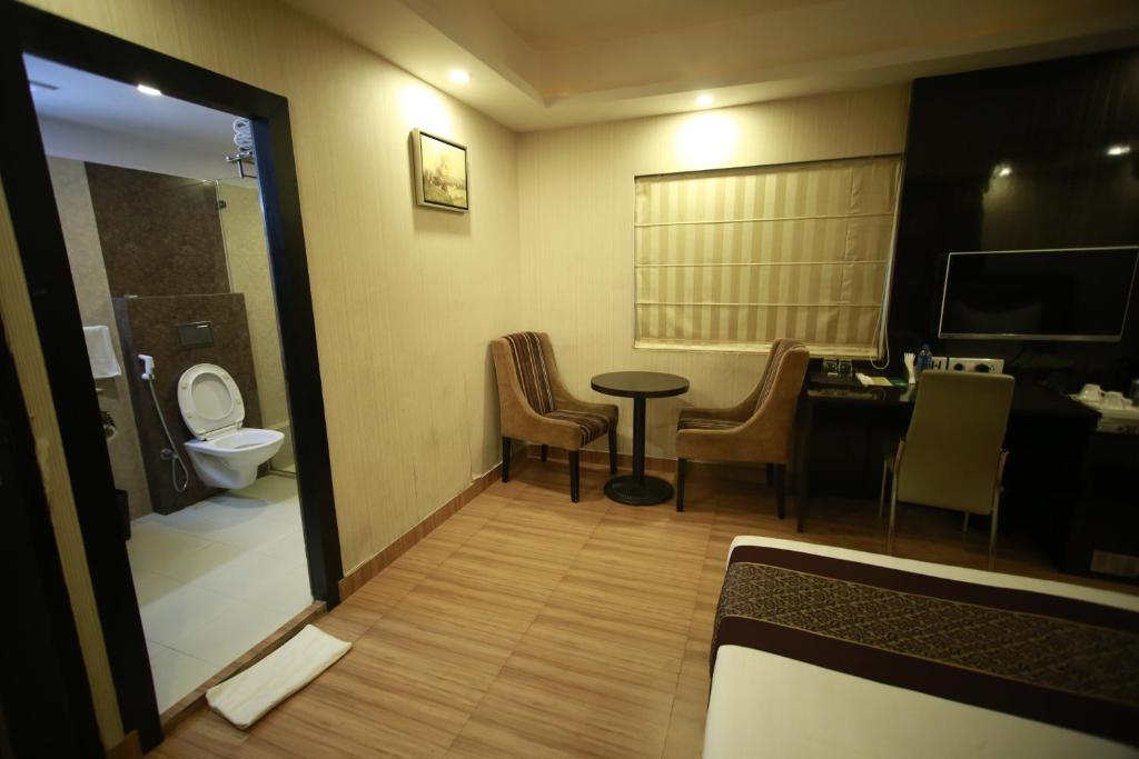 Een badkamer bij Hotel Comfotel Kolkata