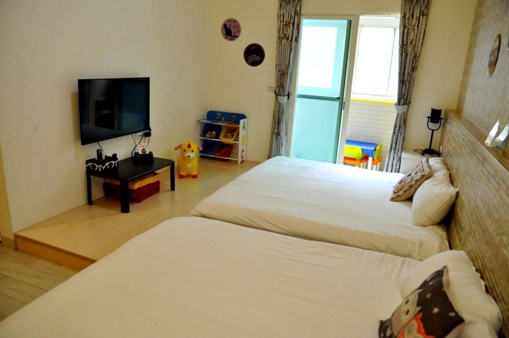 Postel nebo postele na pokoji v ubytování Sky Bird Garden B&B