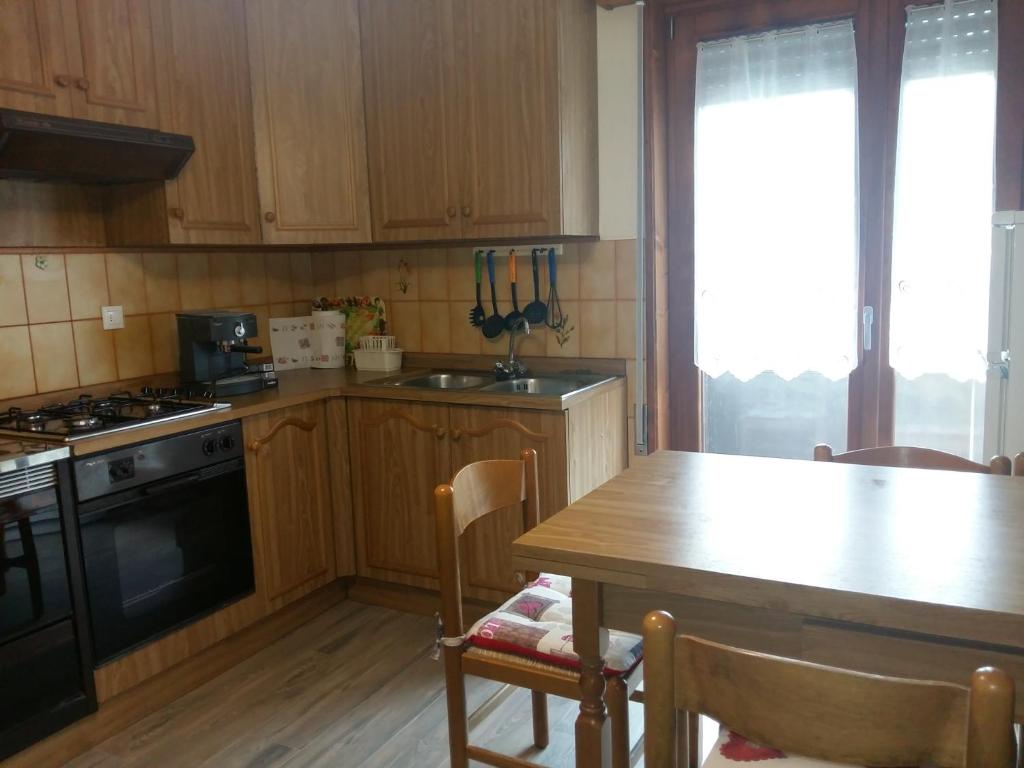 Kuchyňa alebo kuchynka v ubytovaní La casa alta