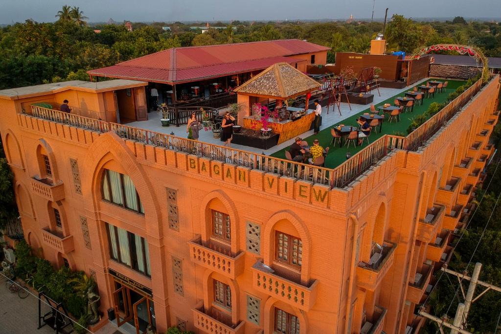 an overhead view of an orange building with a restaurant at Bagan View Hotel in Bagan