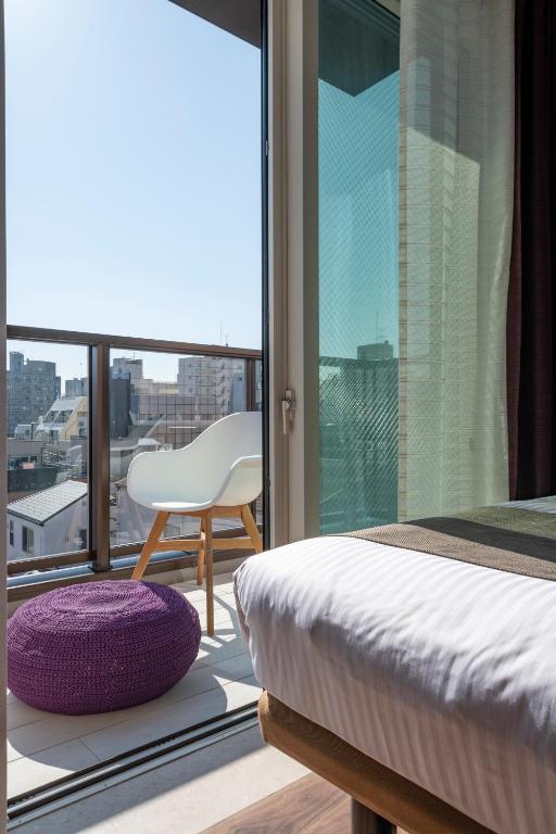 Postel nebo postele na pokoji v ubytování Hotel SAILS Asakusa