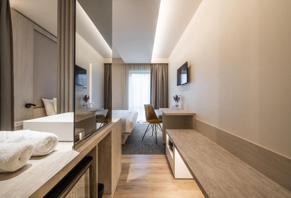 Postel nebo postele na pokoji v ubytování Begijnhof Hotel