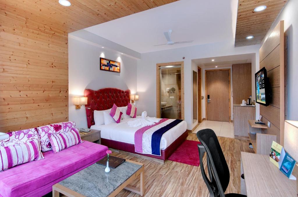 TV a/nebo společenská místnost v ubytování The Orchard Greens Resort - A Centrally Heated Property