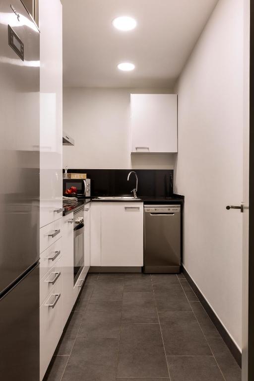 Kuchyň nebo kuchyňský kout v ubytování C211 Barcelona Apartments