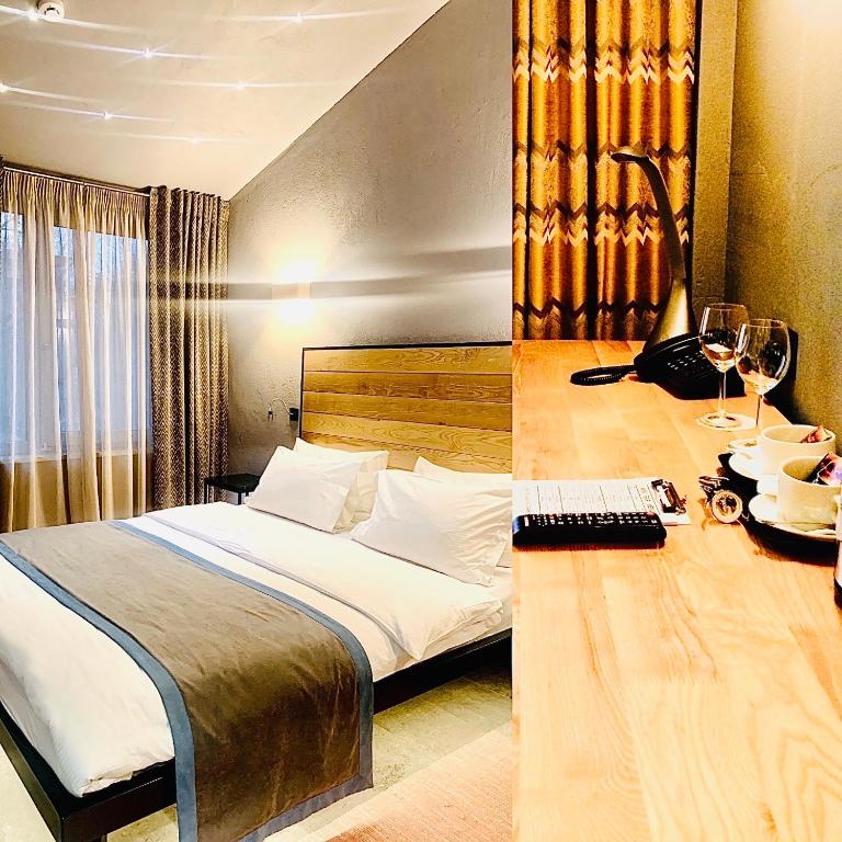 Postel nebo postele na pokoji v ubytování Plai Hotel