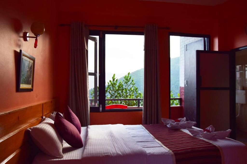 Letto o letti in una camera di Siddhartha Garden Ayurveda