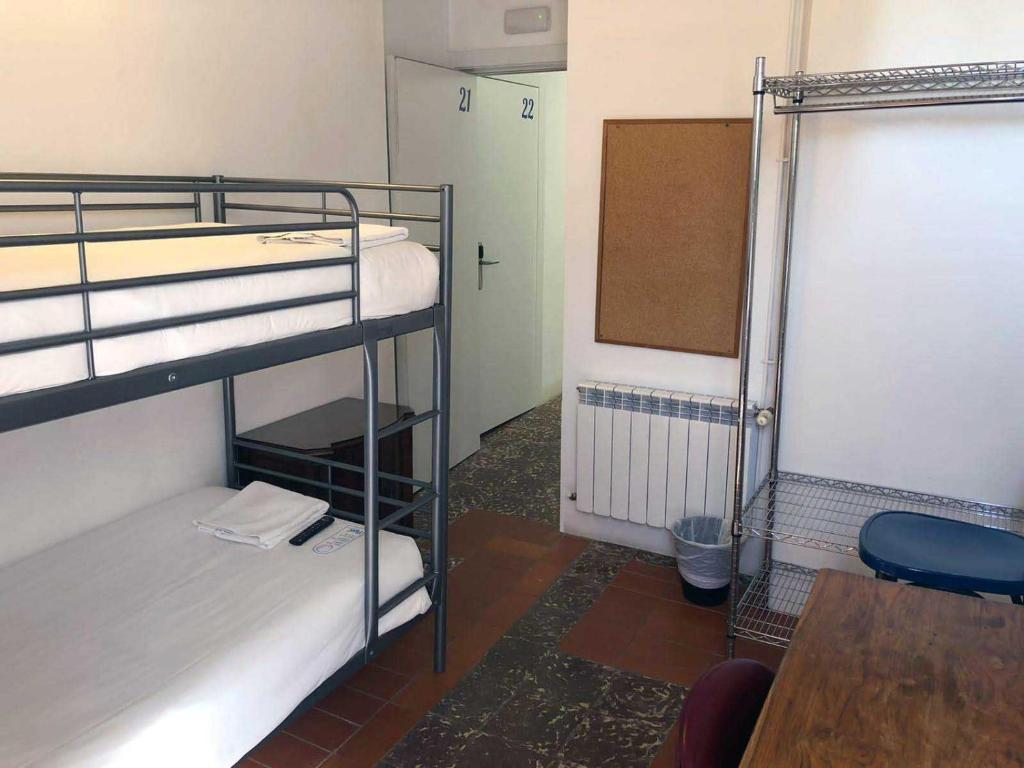 Postel nebo postele na pokoji v ubytování Pigal