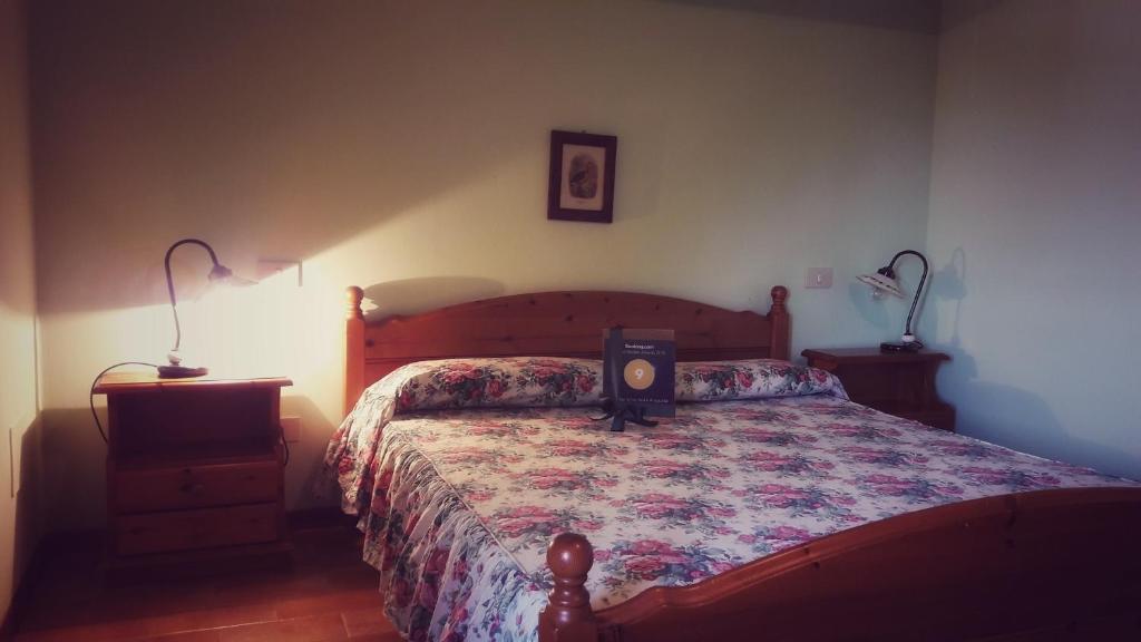 Posteľ alebo postele v izbe v ubytovaní Agriturismo Isola Augusta
