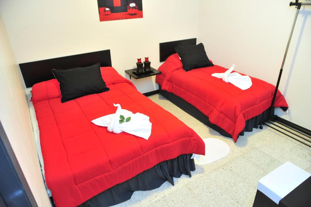 Postel nebo postele na pokoji v ubytování G y V Hotels