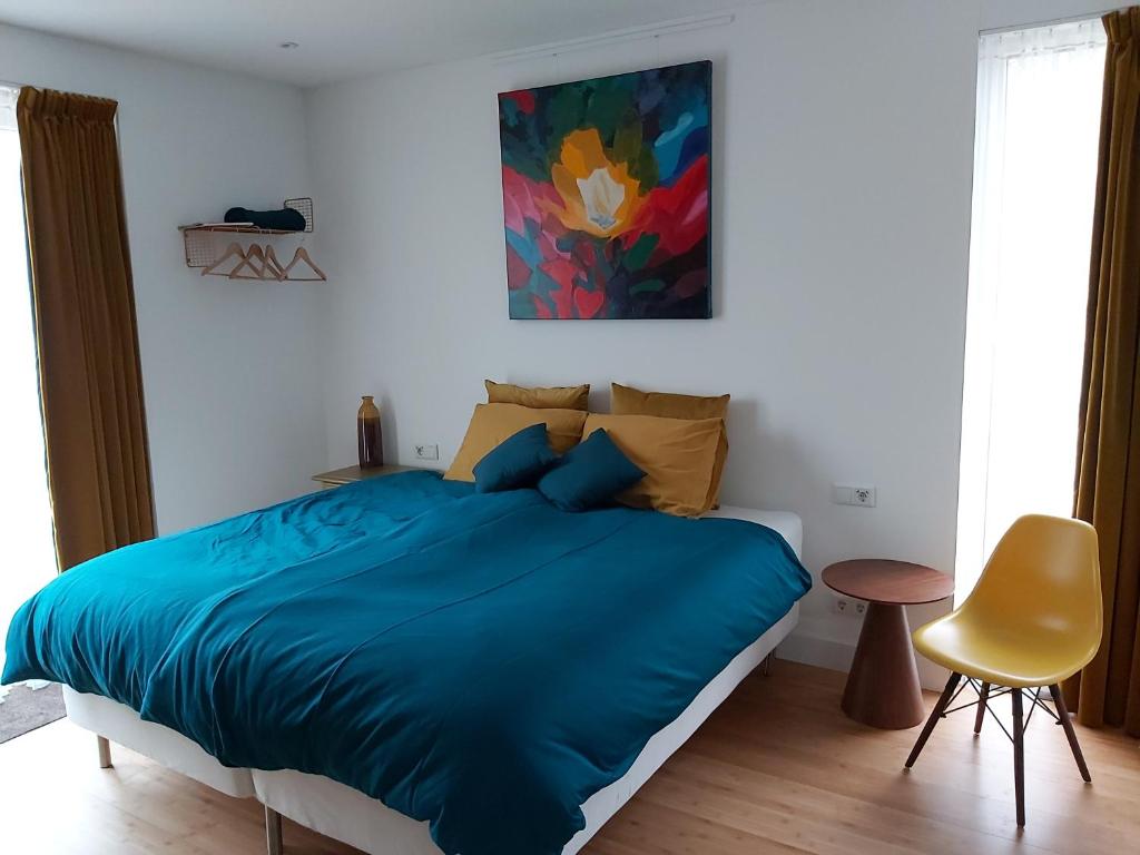 Postel nebo postele na pokoji v ubytování Luxury Suites Oosterwold