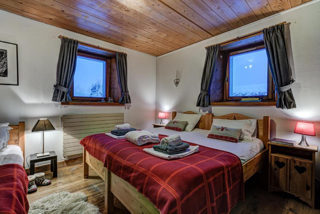 Postel nebo postele na pokoji v ubytování Chalet Tissières