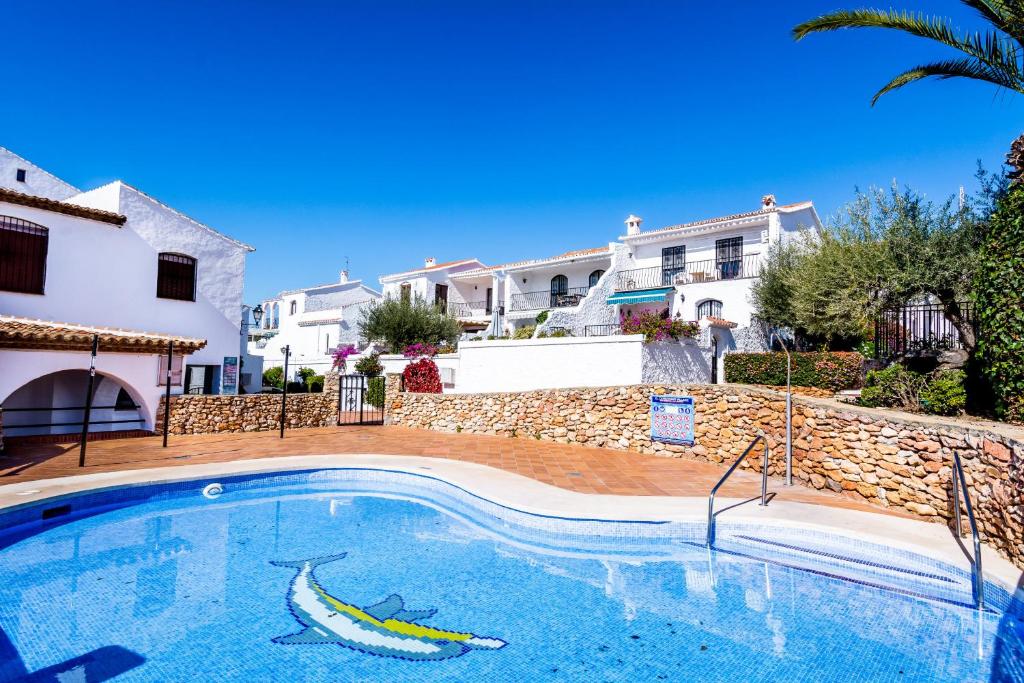 Bazén v ubytovaní Violetas, Nerja alebo v jeho blízkosti