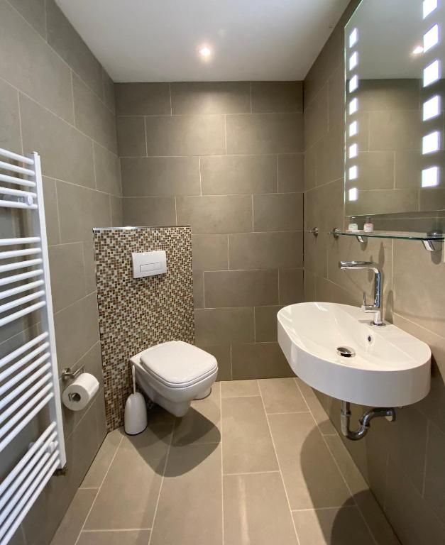 Koupelna v ubytování Wilsmann Apartmentvermietung