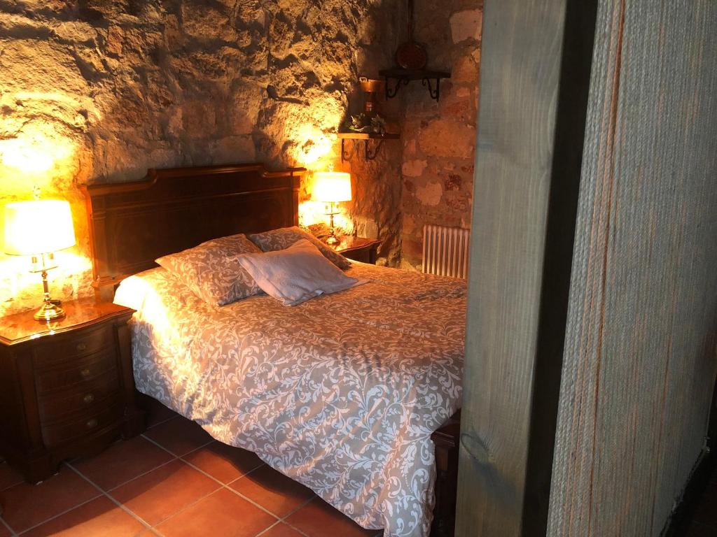 Postel nebo postele na pokoji v ubytování Casa Rural "Rincón del Edén"
