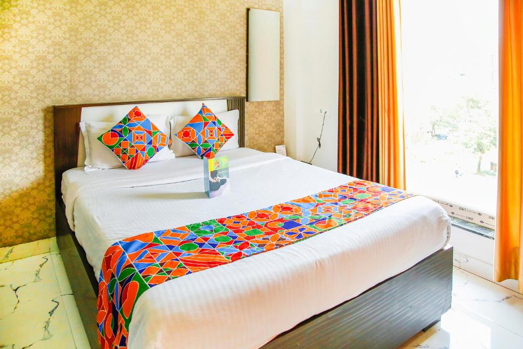 Postel nebo postele na pokoji v ubytování FabHotel Eleanora - New Town