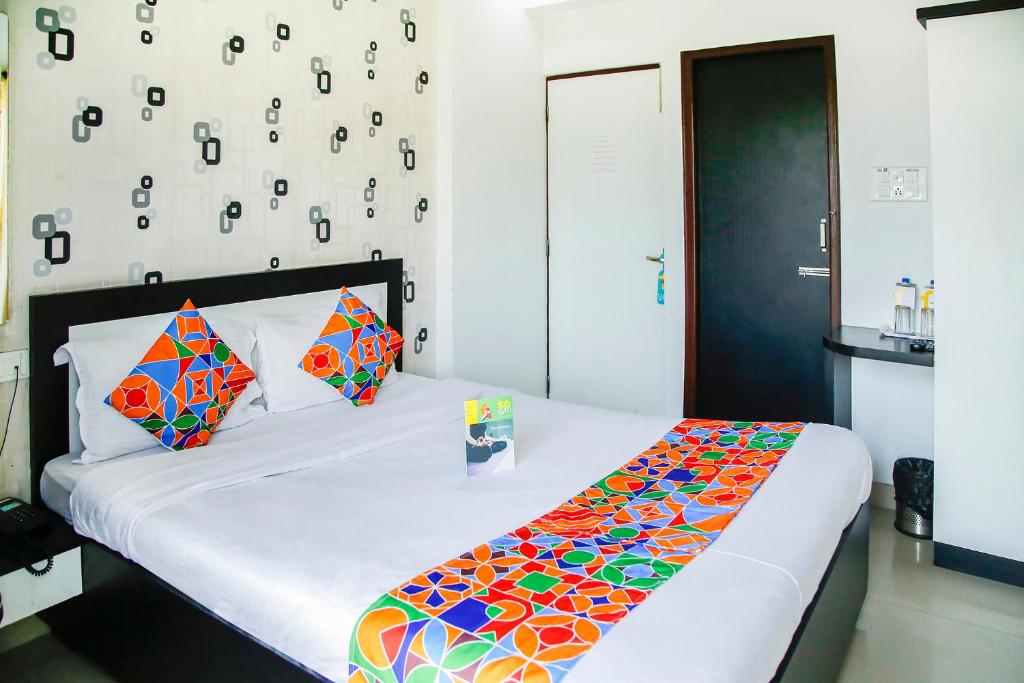 Postel nebo postele na pokoji v ubytování FabHotel Eleanora - New Town