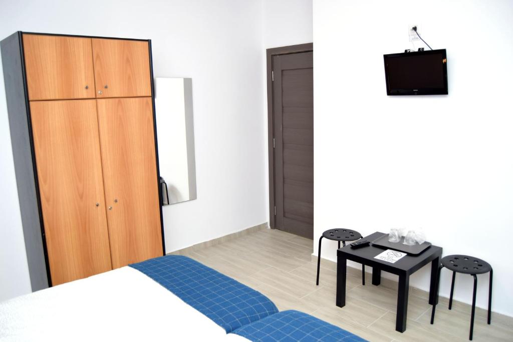 Postel nebo postele na pokoji v ubytování Hotel Road Rooms