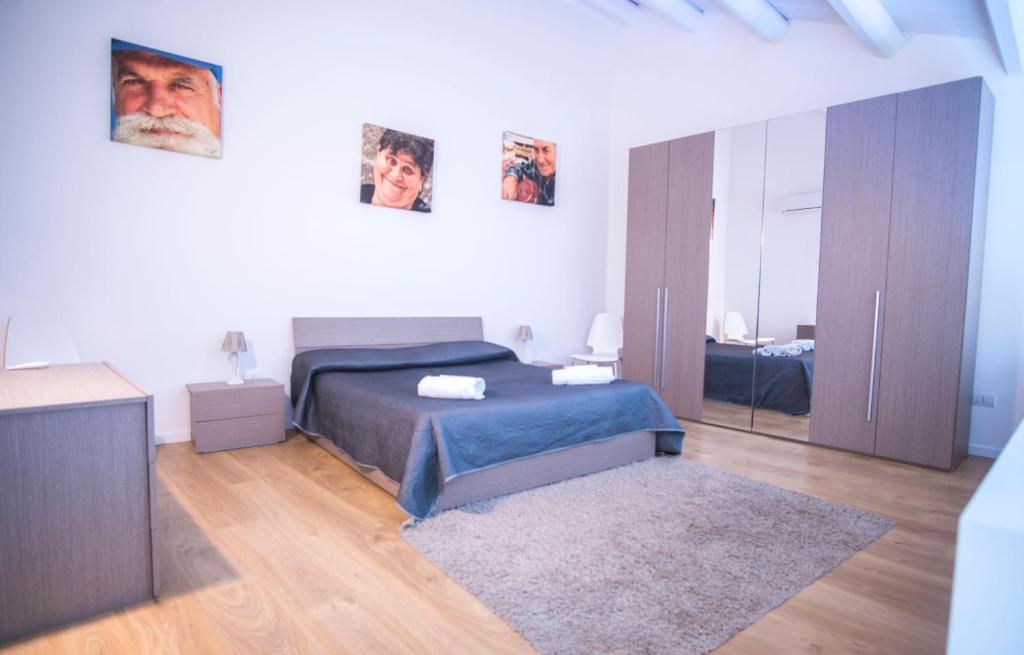 Łóżko lub łóżka w pokoju w obiekcie Casa Gelsomino