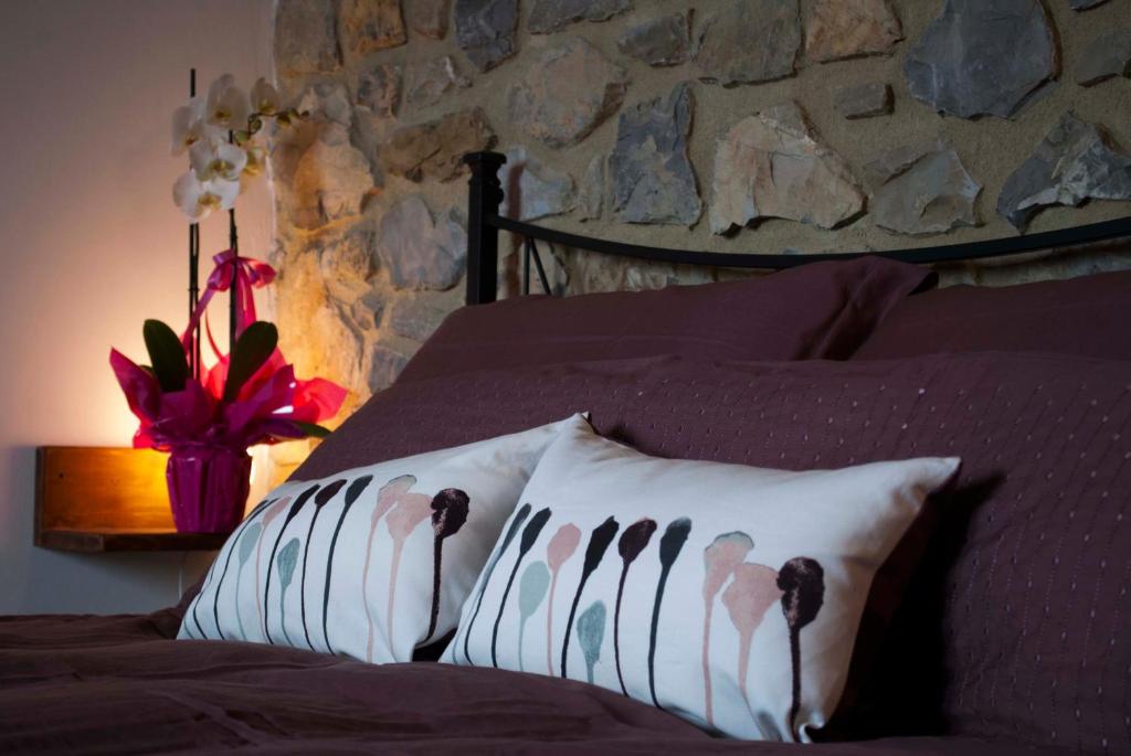 Postel nebo postele na pokoji v ubytování B&B Lavanda e Rosmarino