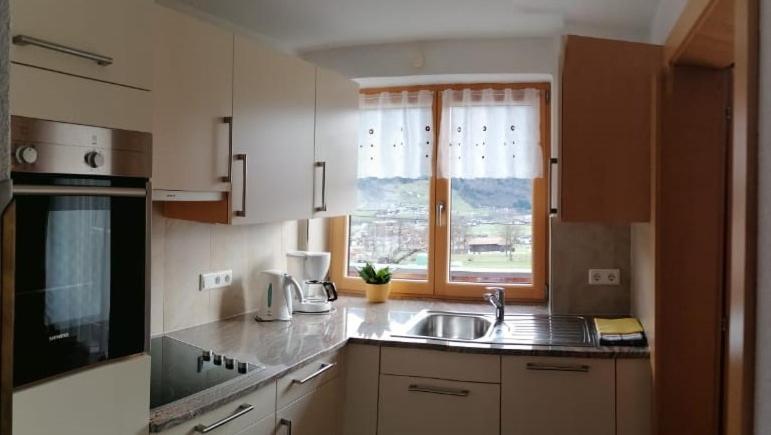 Kuchyň nebo kuchyňský kout v ubytování Ferienhaus Oberhuben