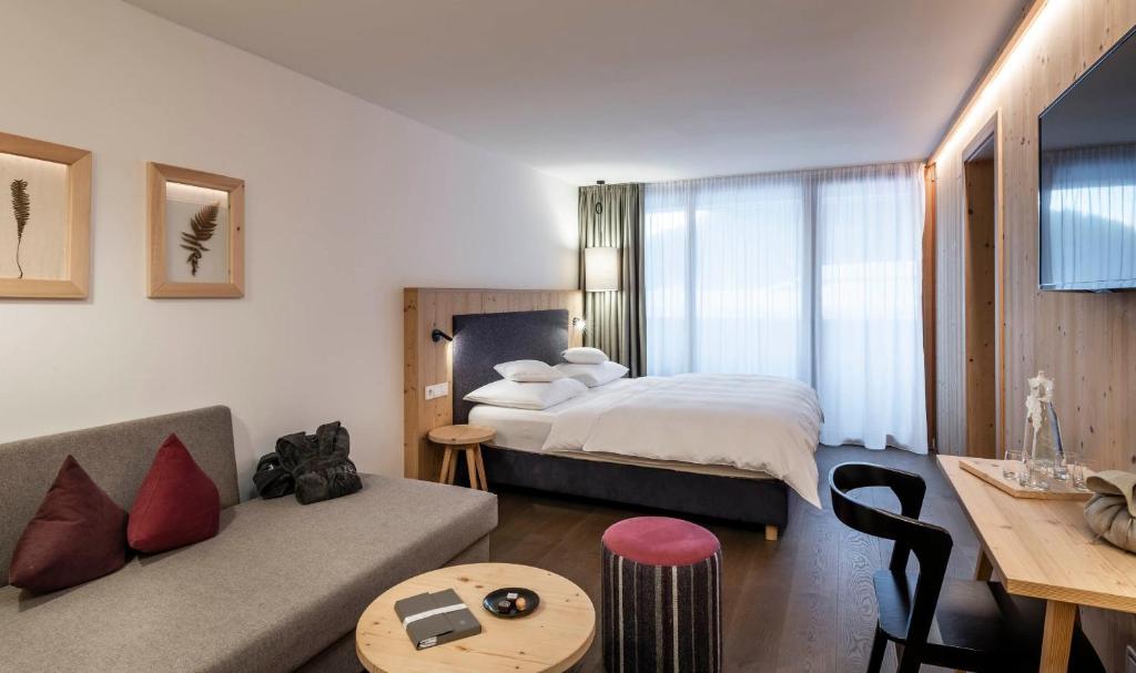 Posteľ alebo postele v izbe v ubytovaní Feuerstein Nature Family Resort