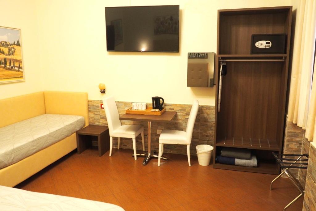 Telewizja i/lub zestaw kina domowego w obiekcie Hotel Ester
