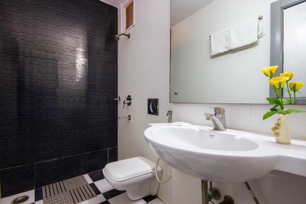 Koupelna v ubytování Hotel Kwality