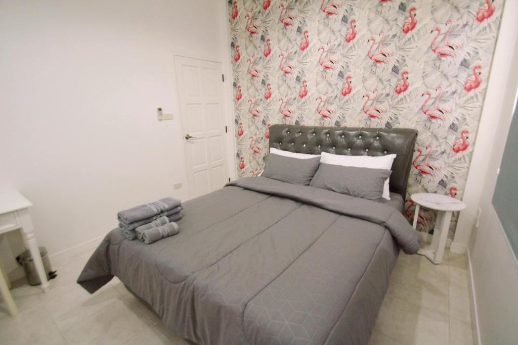 Postel nebo postele na pokoji v ubytování Little home poolvilla