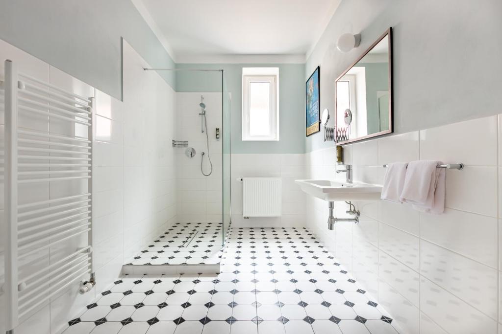 Koupelna v ubytování Boutique Hotel SwissHouse