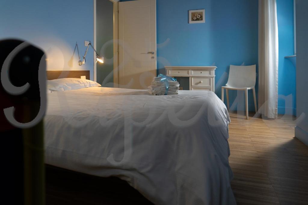 Voodi või voodid majutusasutuse Ripetta 25 Prestige Rooms toas