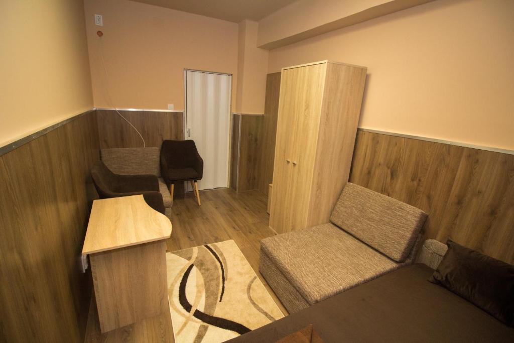 Posezení v ubytování M7 Galéria Panzió