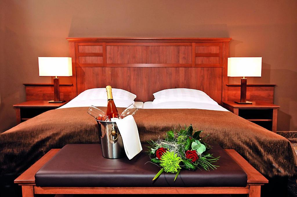 Postel nebo postele na pokoji v ubytování Hotel BurgGartenpalais