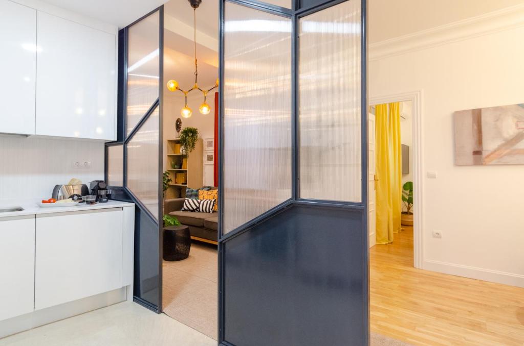 Kuchyň nebo kuchyňský kout v ubytování Palacio Premium Stay