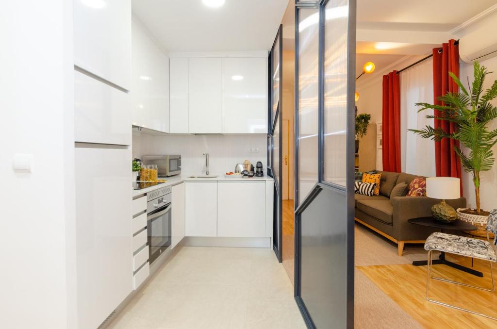 Kuchyň nebo kuchyňský kout v ubytování Palacio Premium Stay