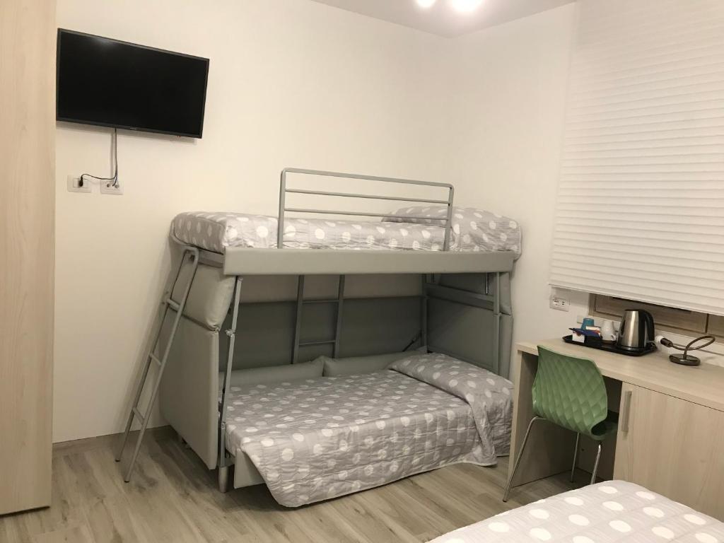 Postel nebo postele na pokoji v ubytování Il Sole e la Luna B&B in Garda