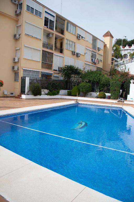 Bazén v ubytovaní MONKÓ - ROSARIO APARTMENT BEACH & SUN o alebo v jeho blízkosti