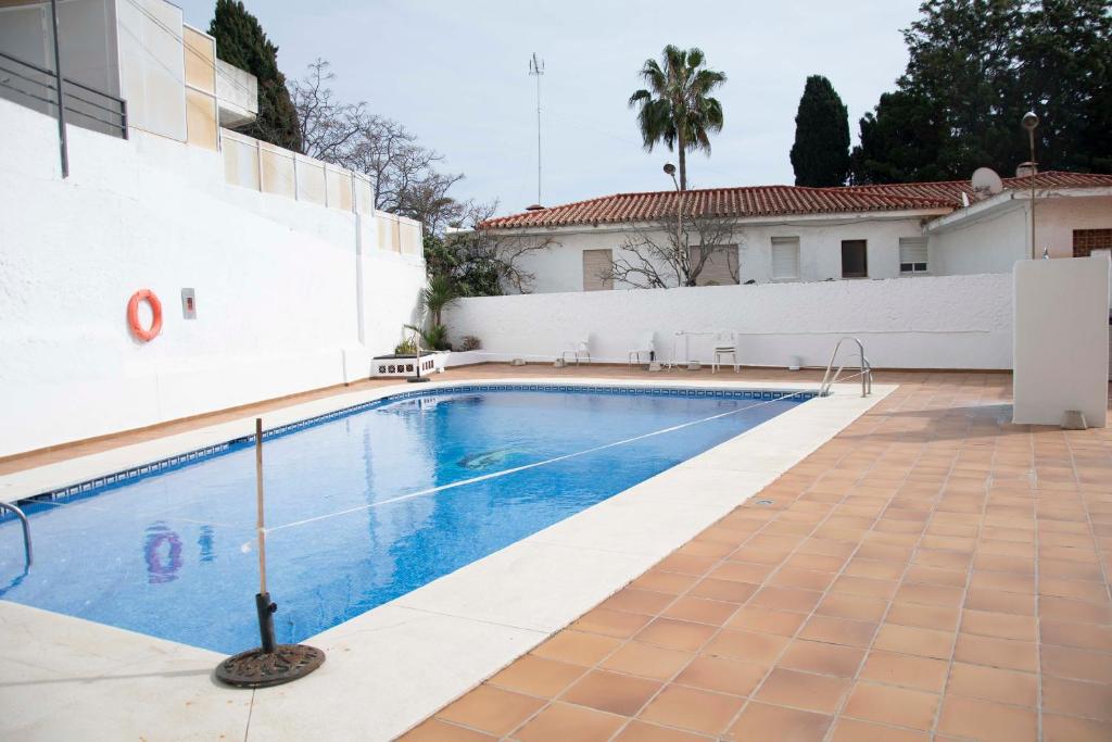 Bazén v ubytovaní MONKÓ - ROSARIO APARTMENT BEACH & SUN o alebo v jeho blízkosti