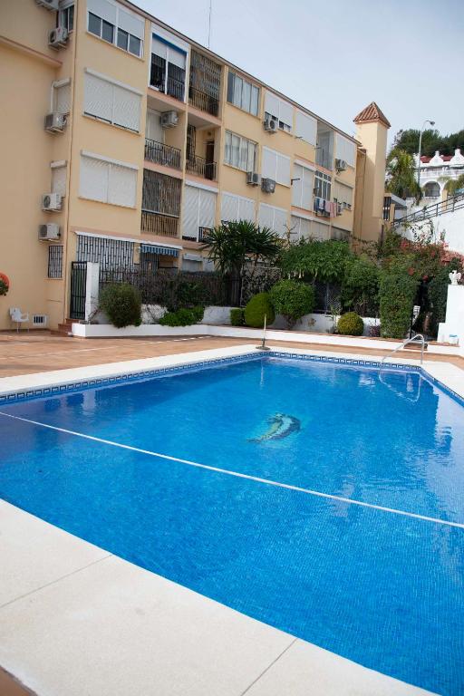 Bazén v ubytovaní MONKÓ - ROSARIO APARTMENT BEACH & SUN o alebo v jeho blízkosti