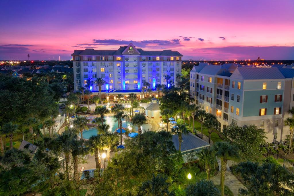 an aerial view of a resort at night at Holiday Inn Express & Suites S Lake Buena Vista by IHG in Kissimmee