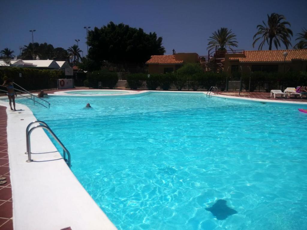 The swimming pool at or close to Bungalows Playa Flor, Campo Internacional, Maspalomas.