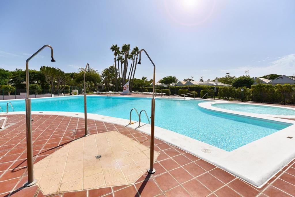 The swimming pool at or close to Bungalows Playa Flor, Campo Internacional, Maspalomas.