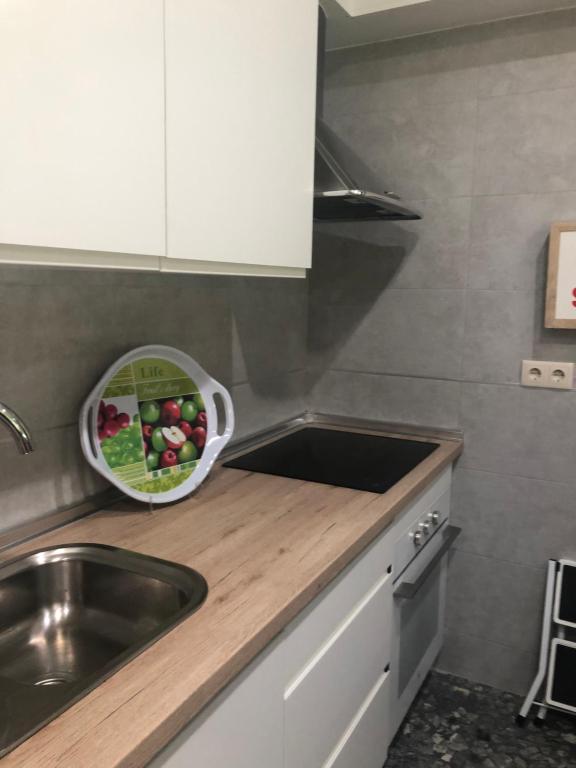 Kuchyň nebo kuchyňský kout v ubytování TORREPEREA- Piso completo