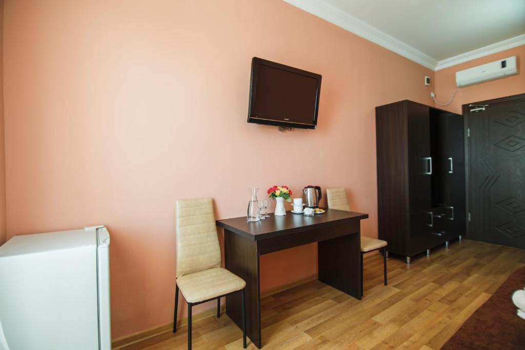 TV a/nebo společenská místnost v ubytování Hotel Egrisi